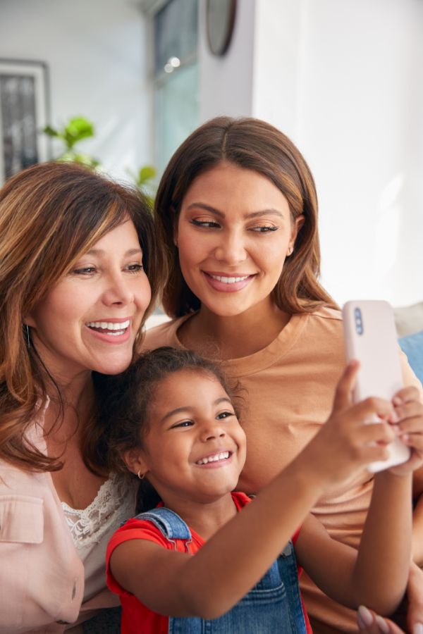 family sharing a phone